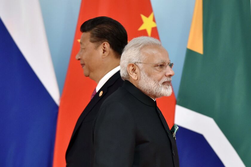 Xi Jinping and Narendra Modi