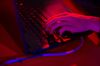 Red light illuminates the keys of a laptop computer at the Dreamhack digital festival in Moscow, Russia, on Saturday, Dec. 5, 2015. Dreamhack is the world's largest digital festival and meeting place for gamers, fans and e-sport enthusiasts.