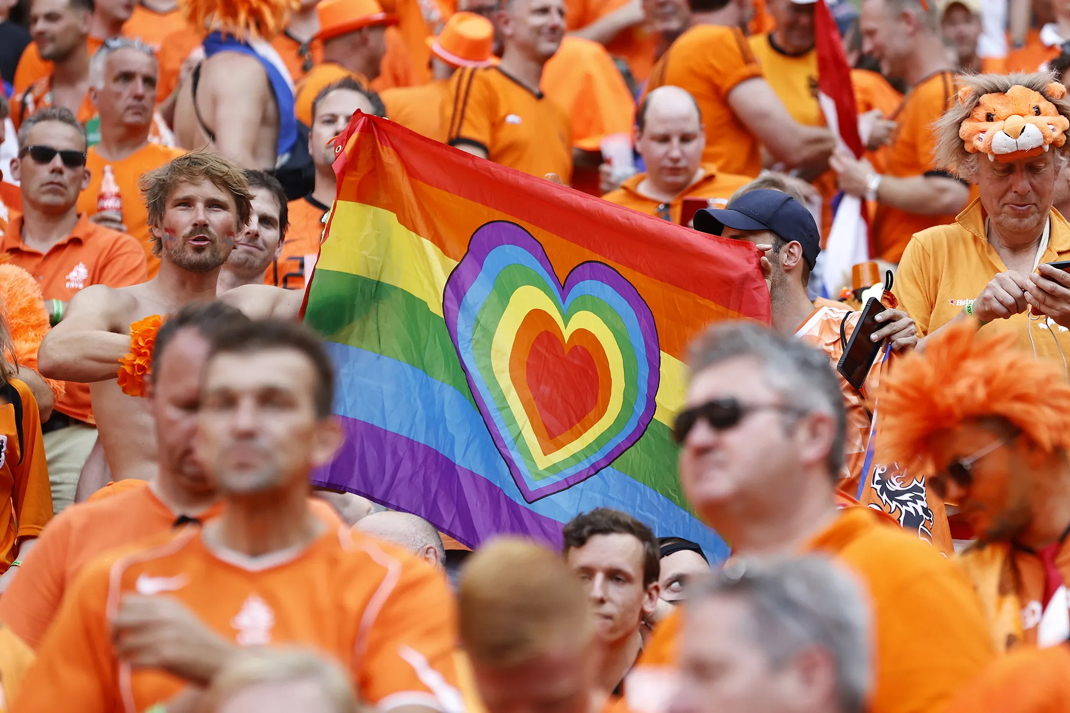 Supporters of the&nbsp;Netherlands hold a Pride flag during the UEFA EURO 2020 match between the Netherlands and the Czech Republic at the Puskas Arena on June 27.