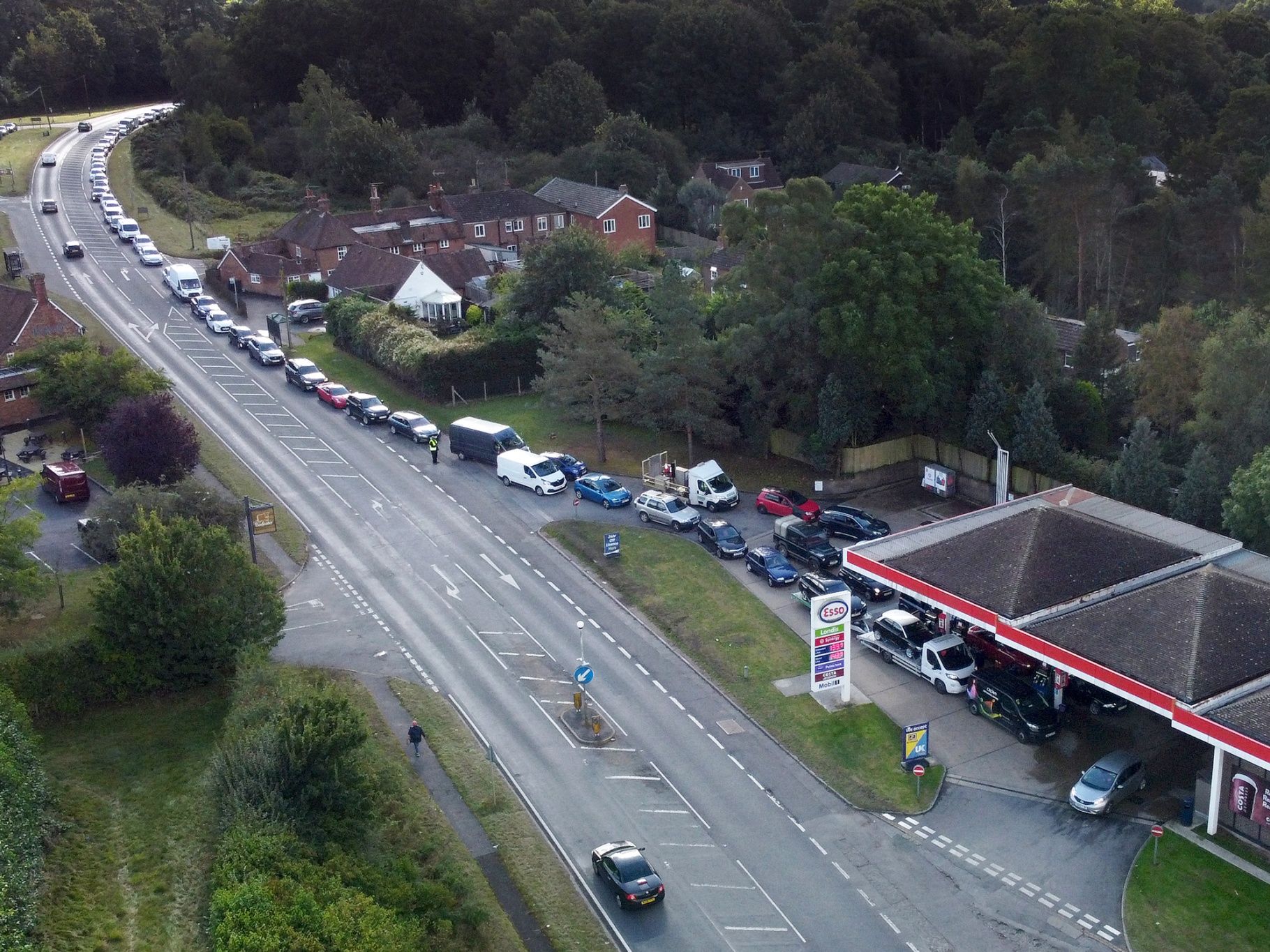 Vehicles queue for fuel at a service station in Ashford, U.K, on Sept. 29.