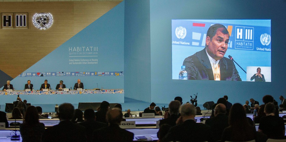 Ecuador's President Rafael Correa is pictured on a screen as he speaks during the opening ceremony of the UN Habitat III conference in Quito.