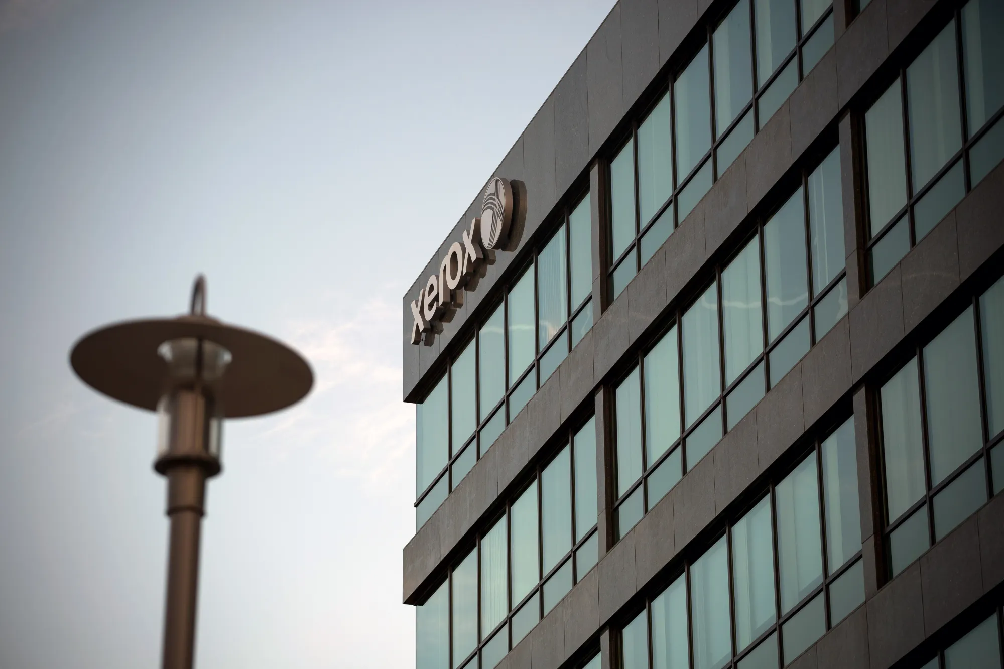 Signage is displayed on the exterior of Xerox Corp. headquarters in Norwalk, Connecticut, U.S., on Thursday, Jan. 5, 2017.&nbsp;