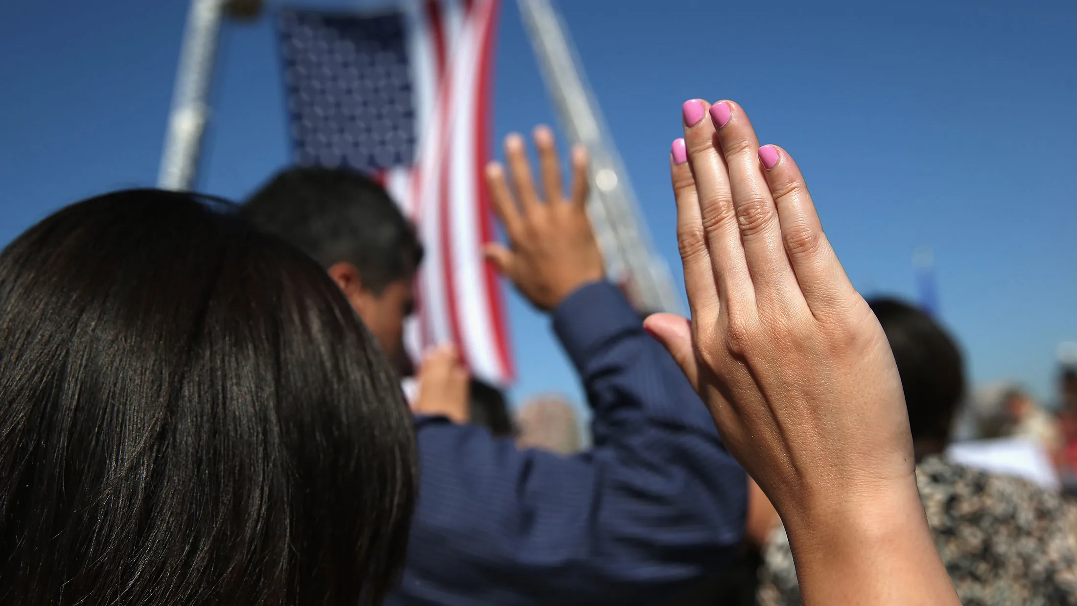 Immigrants become American citizens during a naturalization ceremony on Sept. 17, 2015, in Jersey City, New Jersey.
