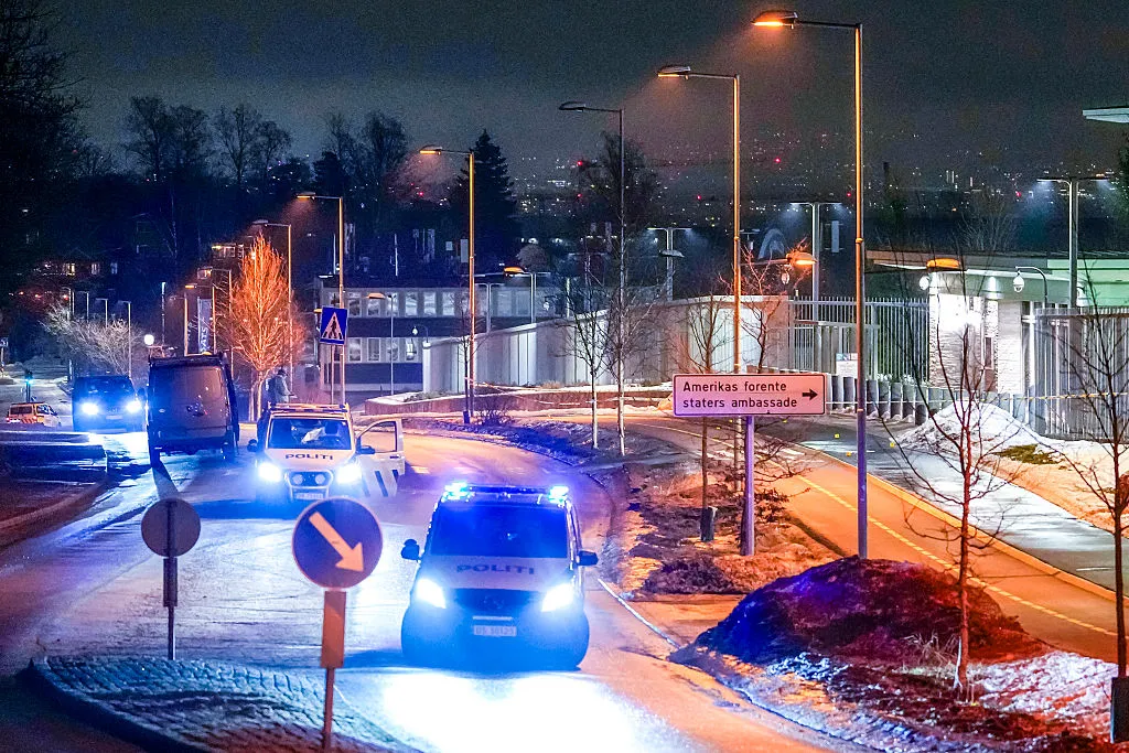 Police vehicles parked outside the US embassy after a reported explosion, in Oslo on March 8.