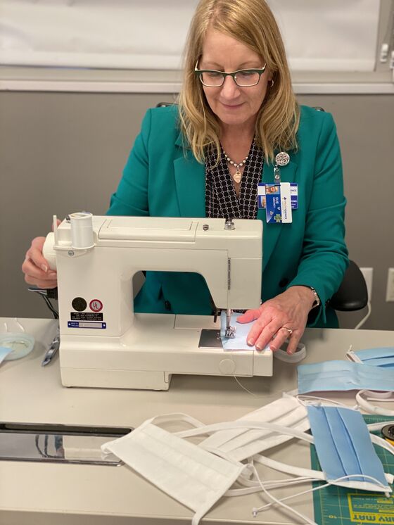 Hospital Workers Make Masks From Office Supplies Amid U.S. Shortage