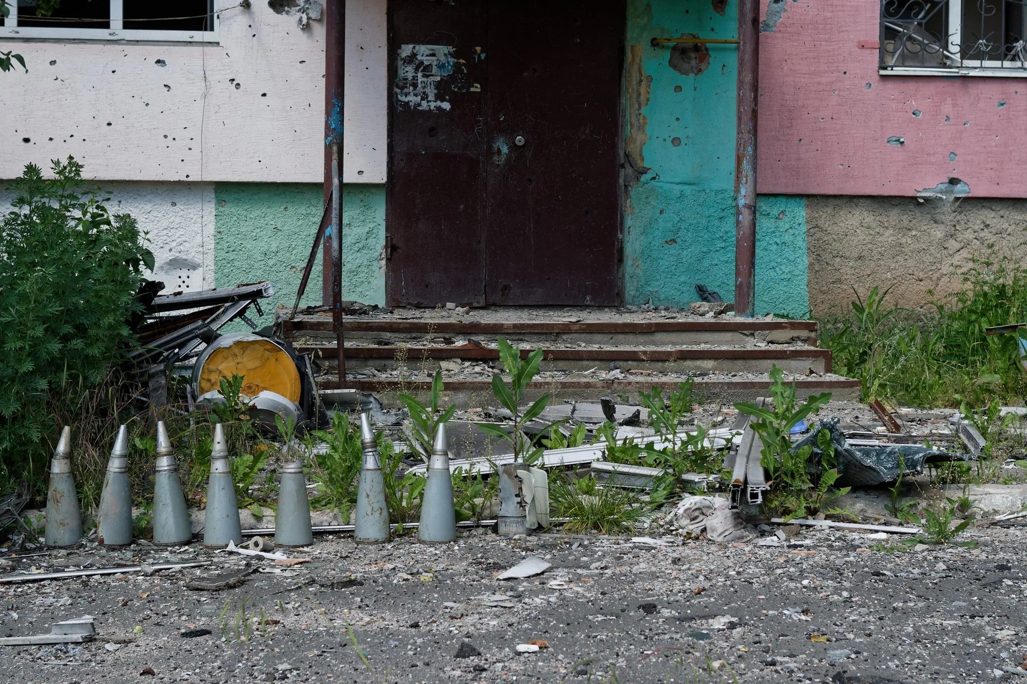 Parts of rockets collected in front of a civilian apartment block in&nbsp;Vugledar, Ukraine, in June 2023.&nbsp;