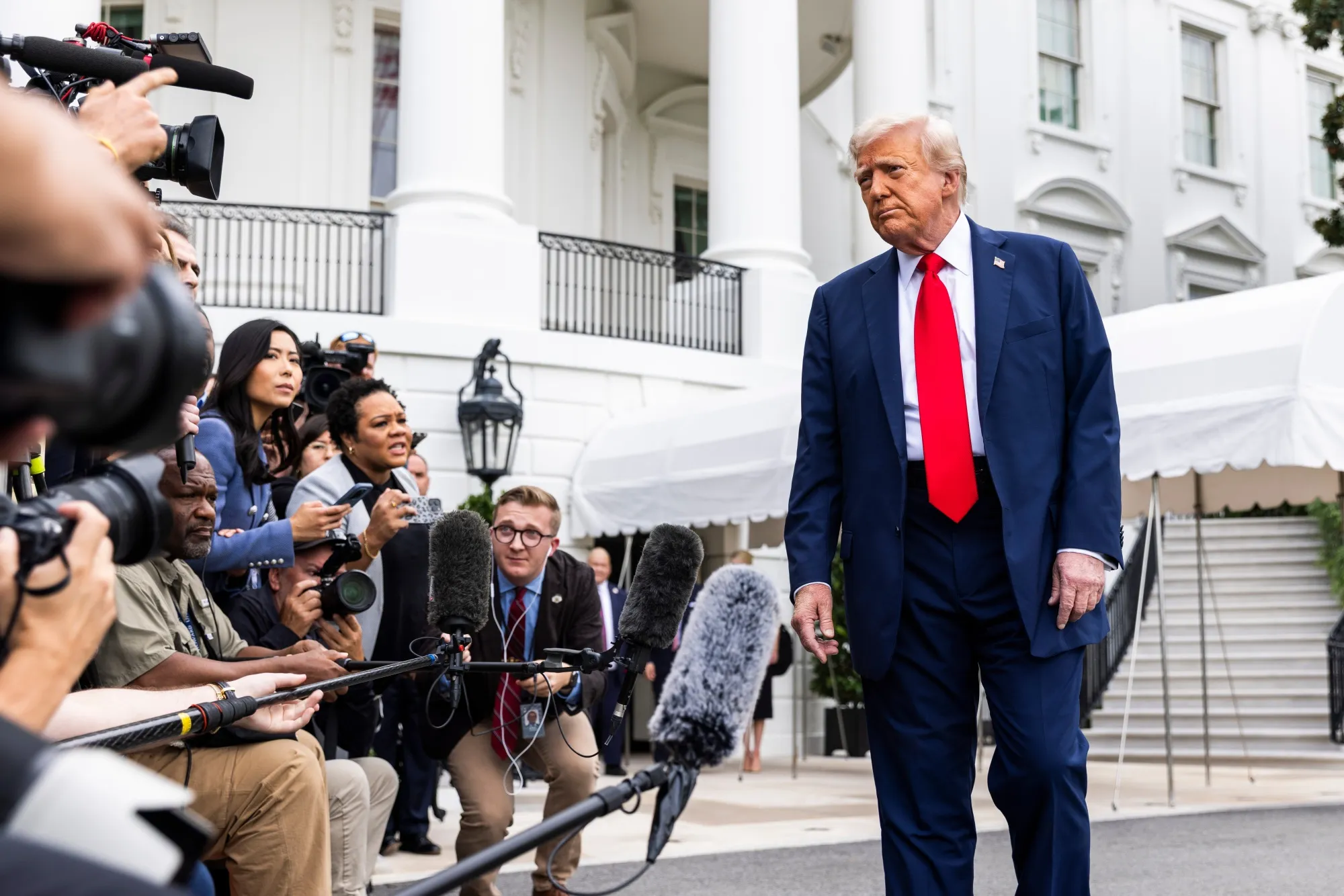 President Trump speaks to members of the media on the South Lawn of the White House before boarding Marine One in Washington, DC, on Sept. 21.