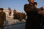 Korean People's Army soldiers walk before&nbsp;statues of late North Korean leaders Kim Il Sung and Kim Jong Il&nbsp;in Pyongyang on Feb.&nbsp;16, 2019.