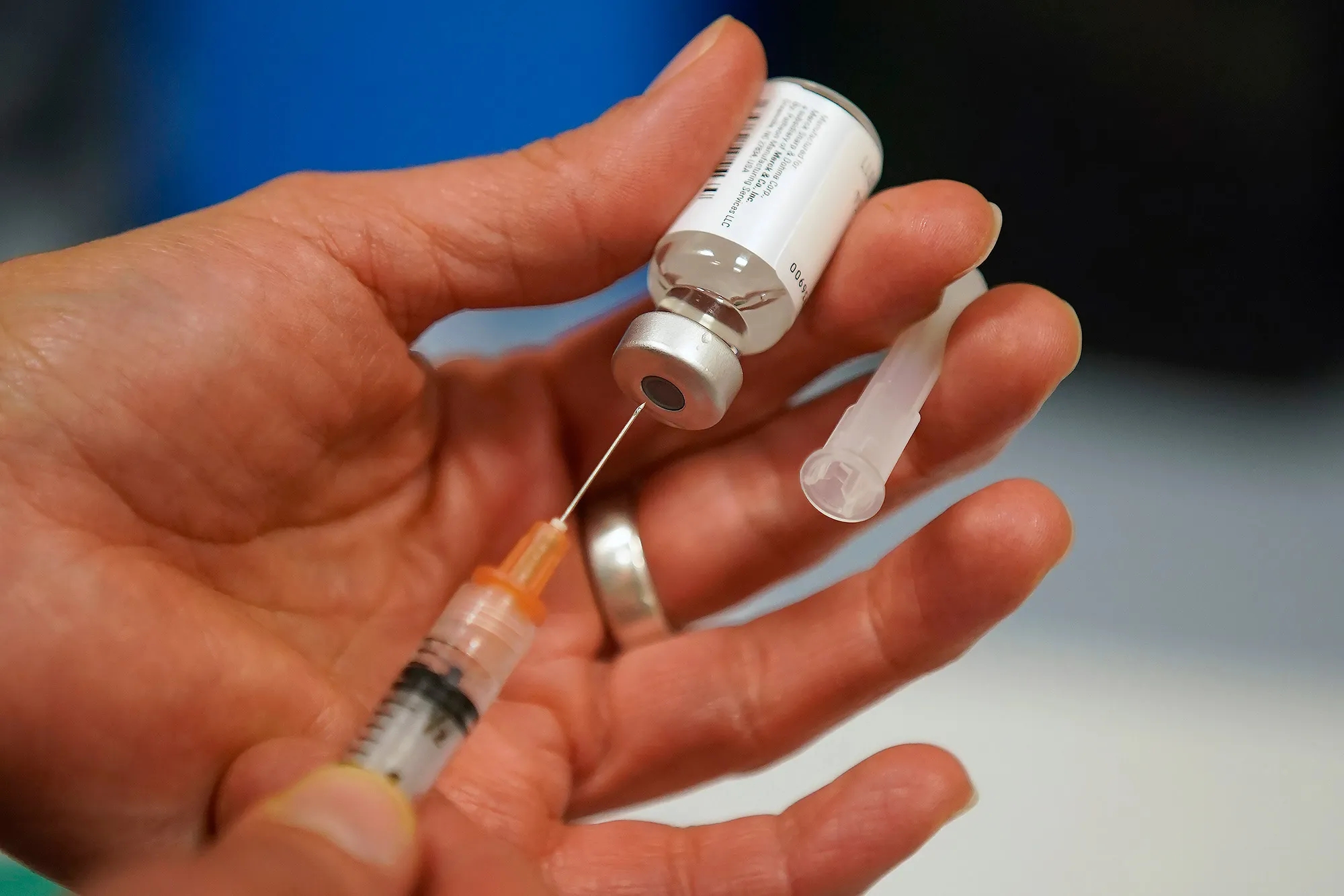 A dose of measles, mumps and rubella virus vaccine is prepared at the Salt Lake County Health Department in Salt Lake City.