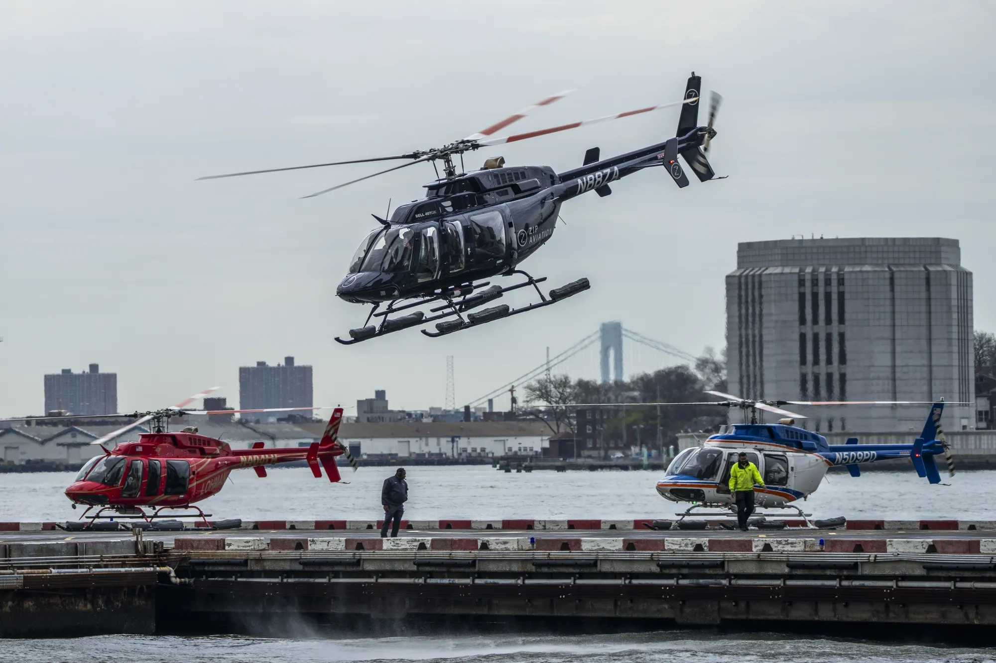 A trio of helicopters at the Downtown Manhattan Heliport&nbsp;on April 14, 2025 in New York City.&nbsp;