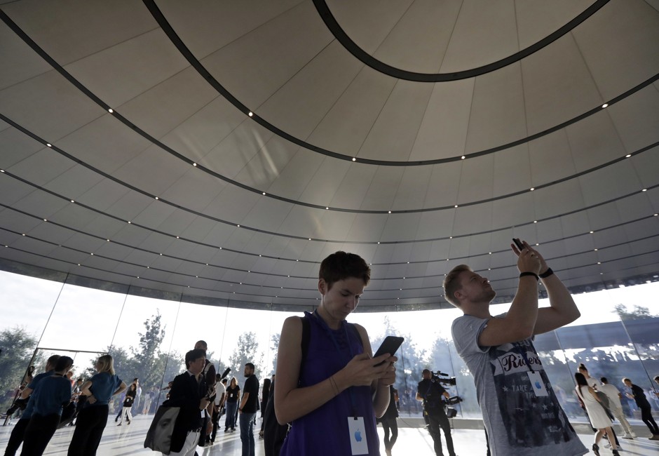 Attendees at a new product announcement event at Apple's campus in Cupertino, California.  