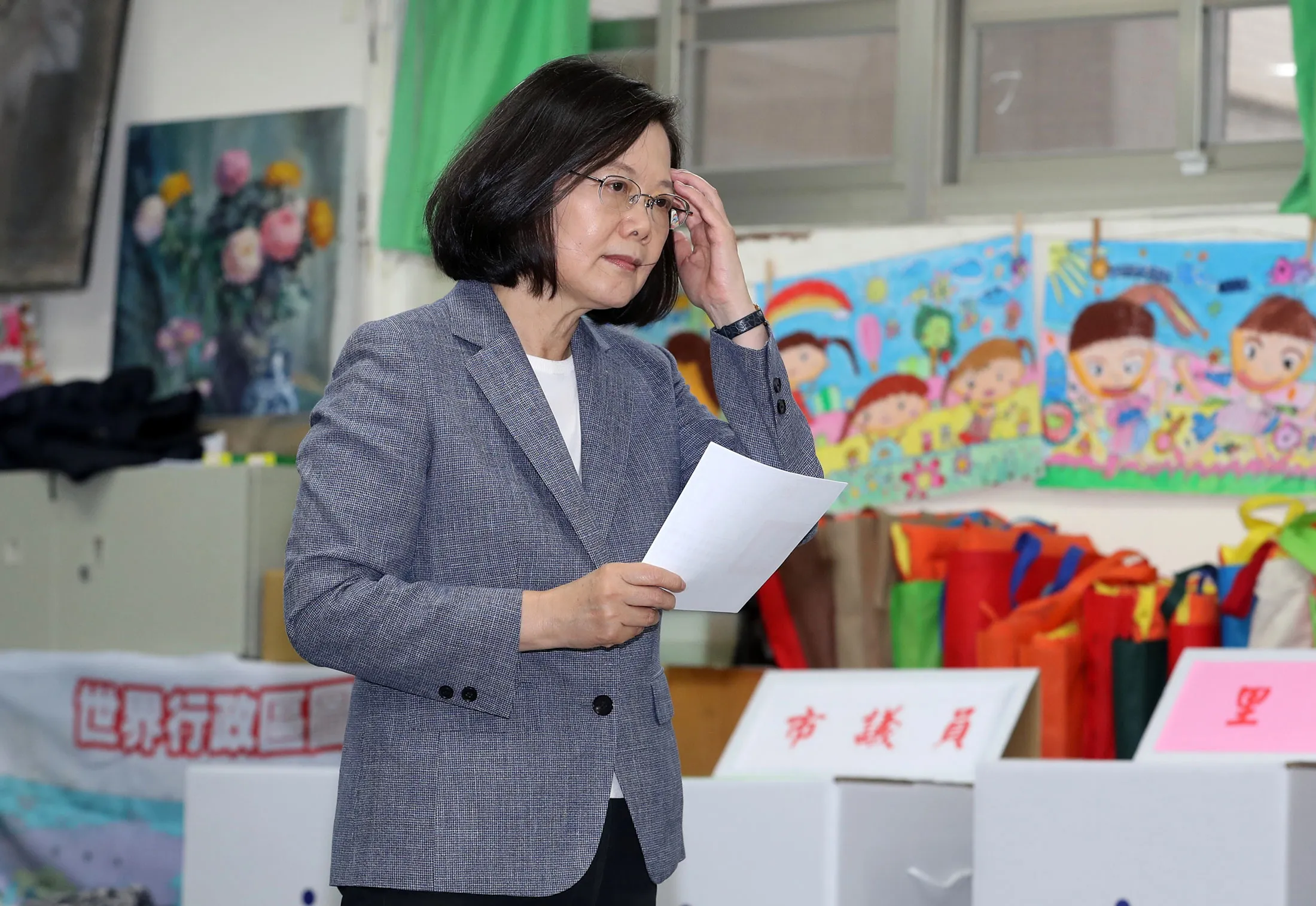Taiwan's President Tsai Ing-wen holds a ballet before voting on Nov. 24.