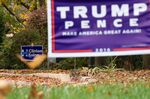 Neighboring residences with Donald Trump and Hillary Clinton campaign signs in their front yards in Valley Forge, Pennsylvania, in 2016.
