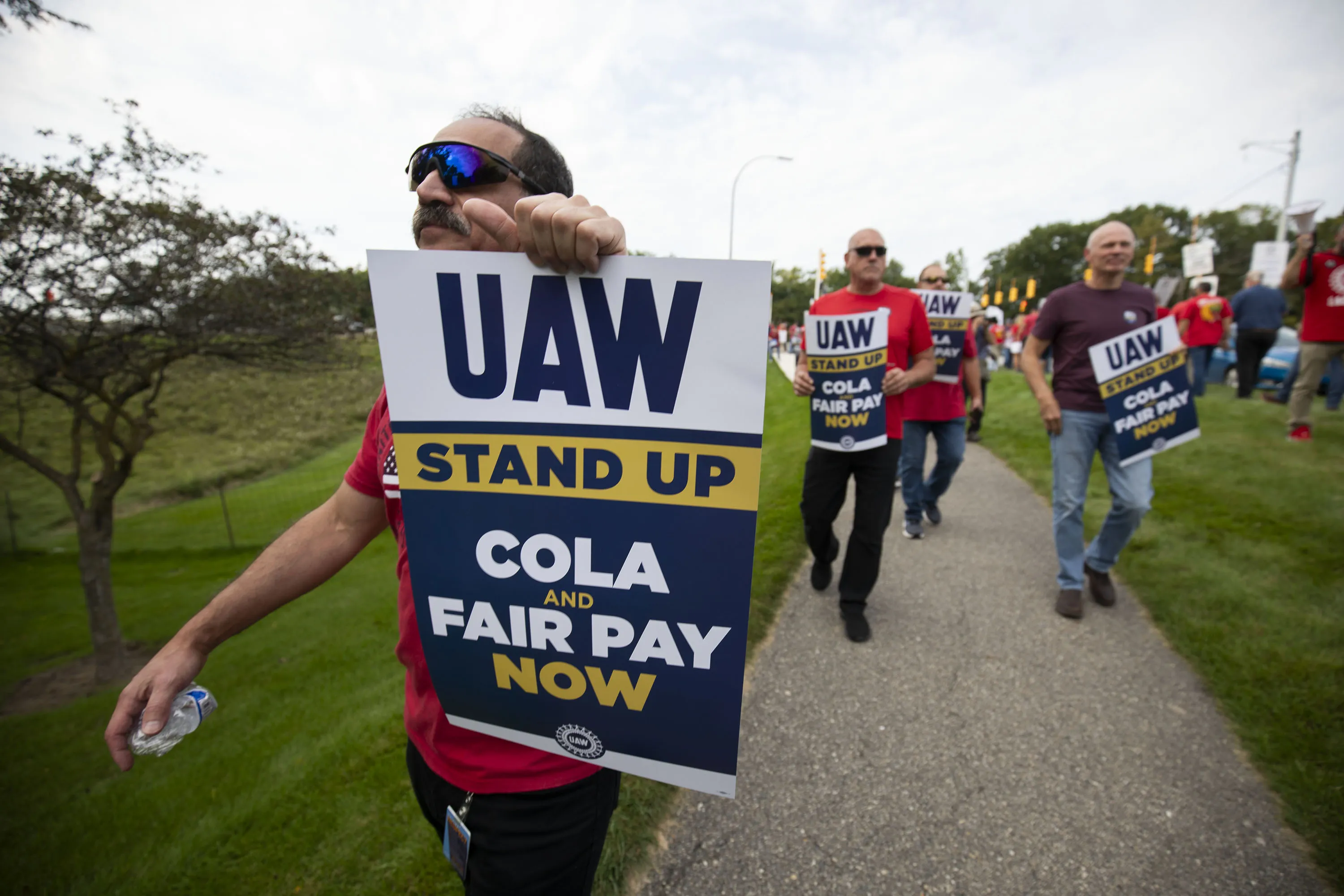 United Auto Workers members and supporters rally at the Stellantis North America headquarters on September 20.&nbsp;