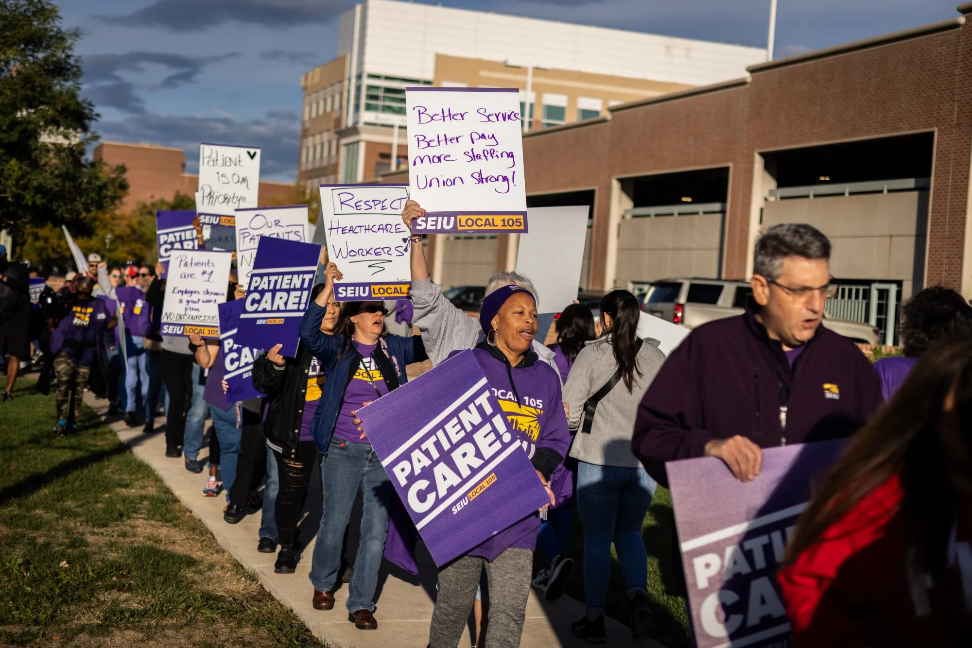 Kaiser Permanente healthcare workers and supporters on a picket line outside Kaiser Permanente medical offices in Denver, Colorado.