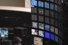 An employee looks at monitors at the Tokyo Stock Exchange (TSE), operated by Japan Exchange Group Inc. (JPX), in Tokyo, Japan, on Tuesday, May 7, 2019. Trading resumed Tuesday after a 10-day Golden Week holiday with a slew of news for investors to process.