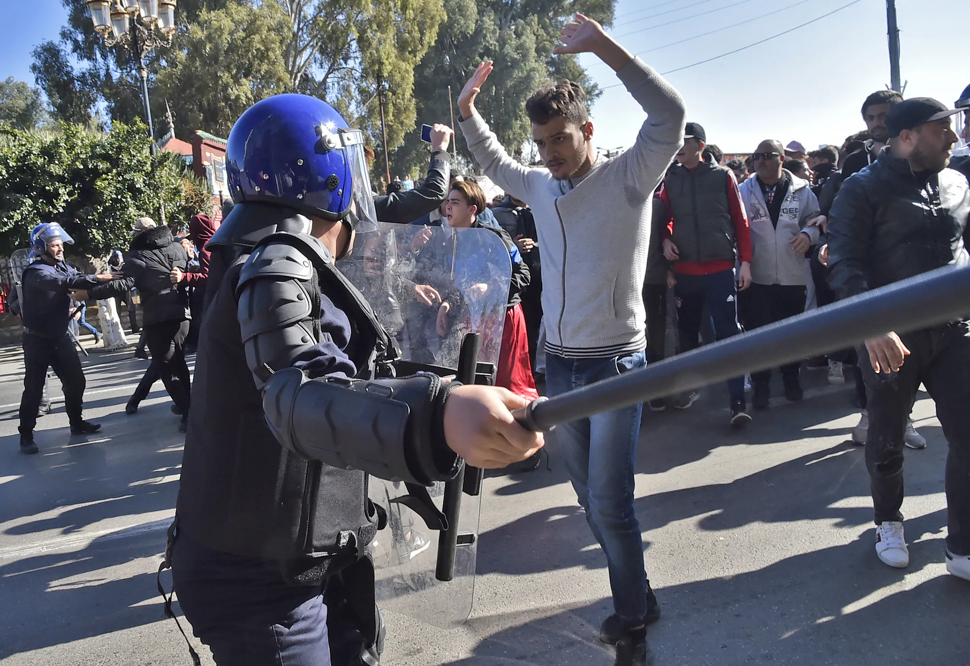 Algerian demonstrators scuffle with security forces during a demonstration&nbsp;in Algiers on Feb.&nbsp;22, 2019.
