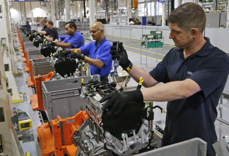 Workers assembling diesel engines at the Ford plant in Dagenham, East London.