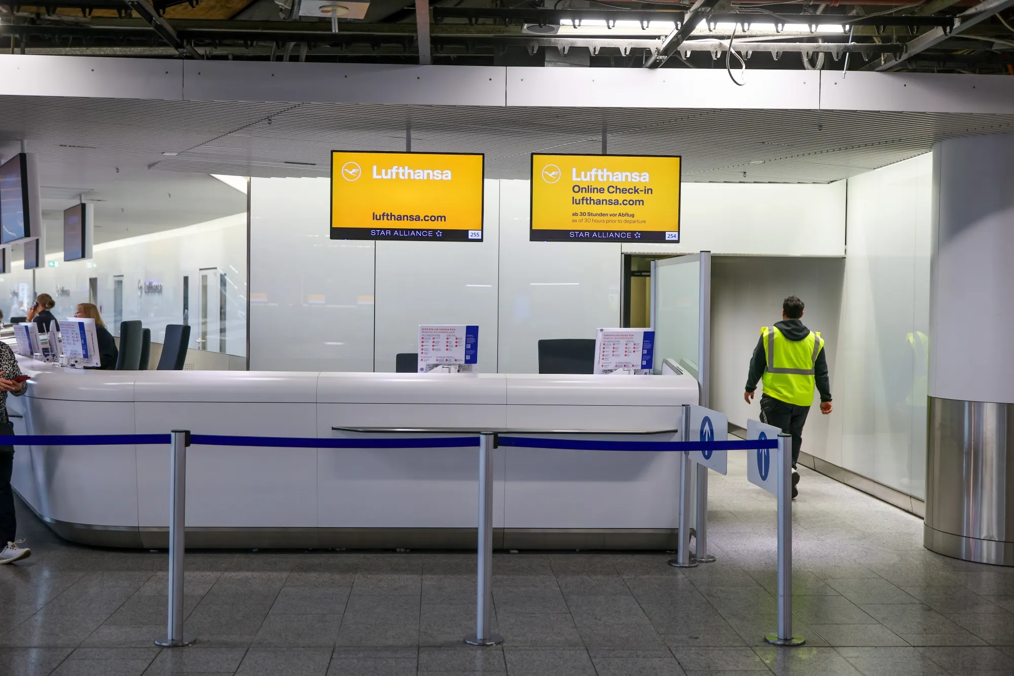 Empty Deutsche Lufthansa AG service desks at Frankfurt Airport, on Sept. 29.