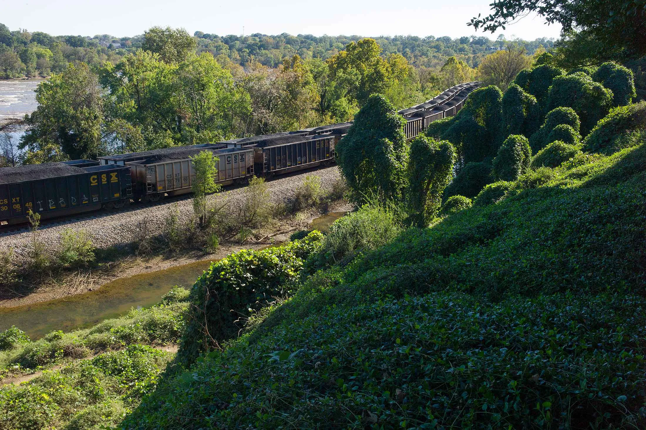 RICHMOND, VA - OCTOBER 18: Coal trains follow the path of the James River on October 18, 2018 as they enter downtown Richmond, Virginia.