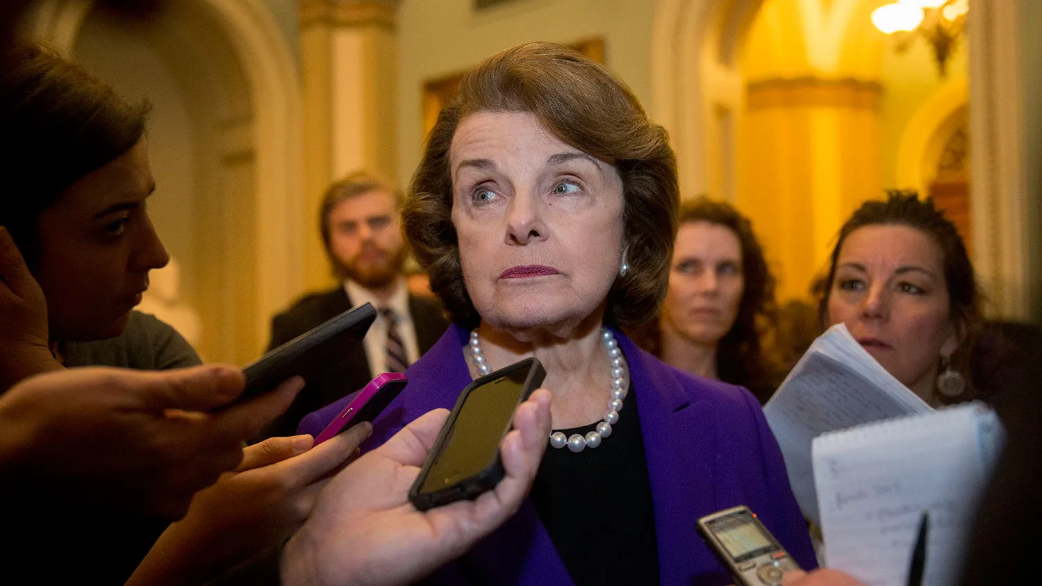 Senator Dianne Feinstein, a Democrat from California and chairman of the Senate Intelligence Committee, talks with the media after speaking in the Senate Chamber at the U.S. Capitol in Washington, D.C., U.S., on Tuesday, Dec. 9, 2014.
