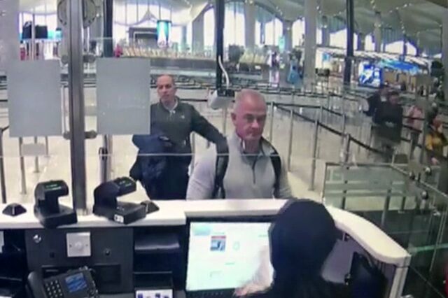Security camera footage of Michael Taylor, right, and George-Antoine Zayek at passport control at Istanbul Airport in Turkey on Dec. 30, 2019.