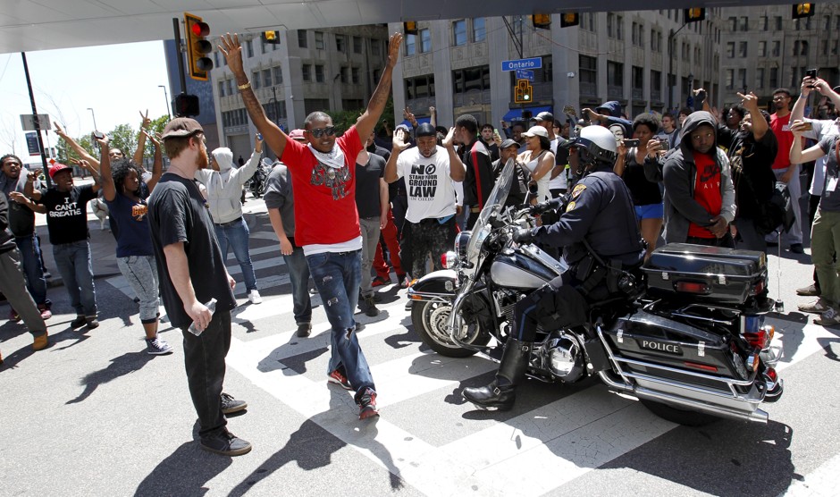 Cleveland residents protest the acquittal of a police officer involved in the 2012 deaths of two unarmed African Americans.