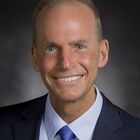 Headshot of Dennis A Muilenburg