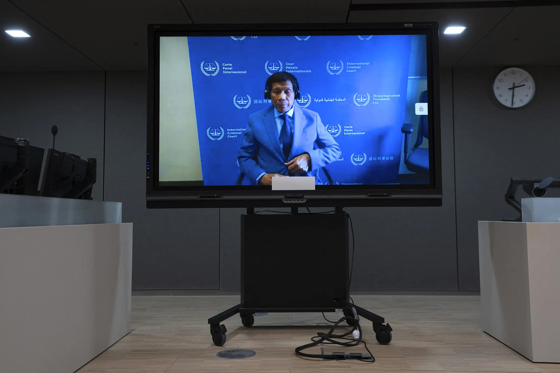 Rodrigo Duterte on a screen in the courtroom during his first appearance before the International Criminal Court (ICC) in The Hague on March 14.