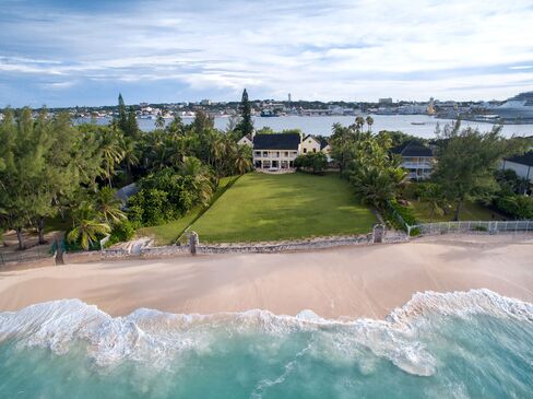 Kilkee House goes on the auction block on Jan. 14, with a reserve price of $10 million. It sits on more than 2 acres of property on Paradise Island, with Nassau harbor on one side and expansive lawns and gardens leading to 200 feet of oceanfront on the other.