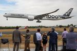 An Airbus SE A350-1000 lands on the opening day of the Farnborough International Airshow in 2018.