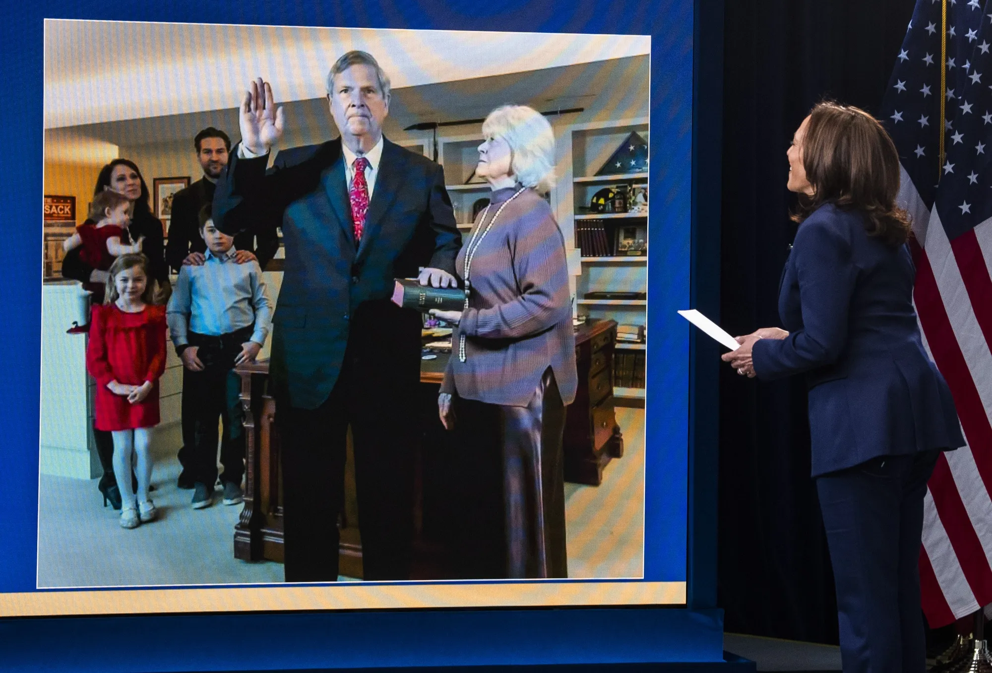 U.S. Vice President Kamala Harris&nbsp;swears in Tom Vilsack&nbsp;during a virtual ceremony in February.&nbsp;