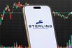 Sterling Infrastructure Logo Shown on Smartphone with Latest Stock Market Chart