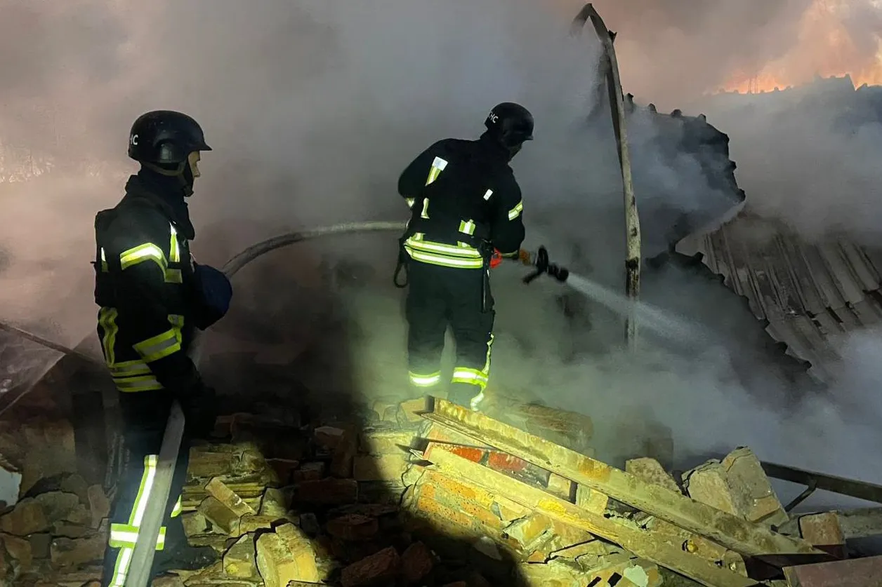 Emergency services attend the site of a Russian attack in Volyn region, Ukraine, in a photo released on Nov. 28.