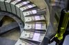 Packs of freshly printed 20 USD notes are processed for bundling and packaging at the US Treasury's Bureau of Engraving and Printing in Washington, DC July 20, 2018. - The dollar slid against the euro and pound on Friday, July 20, 2018, as US President Donald Trump adopted an aggressive posture on trade and foreign exchange, stoking talk of a currency war in addition to a trade war. (Photo by Eva HAMBACH / AFP) (Photo credit should read EVA HAMBACH/AFP/Getty Images)