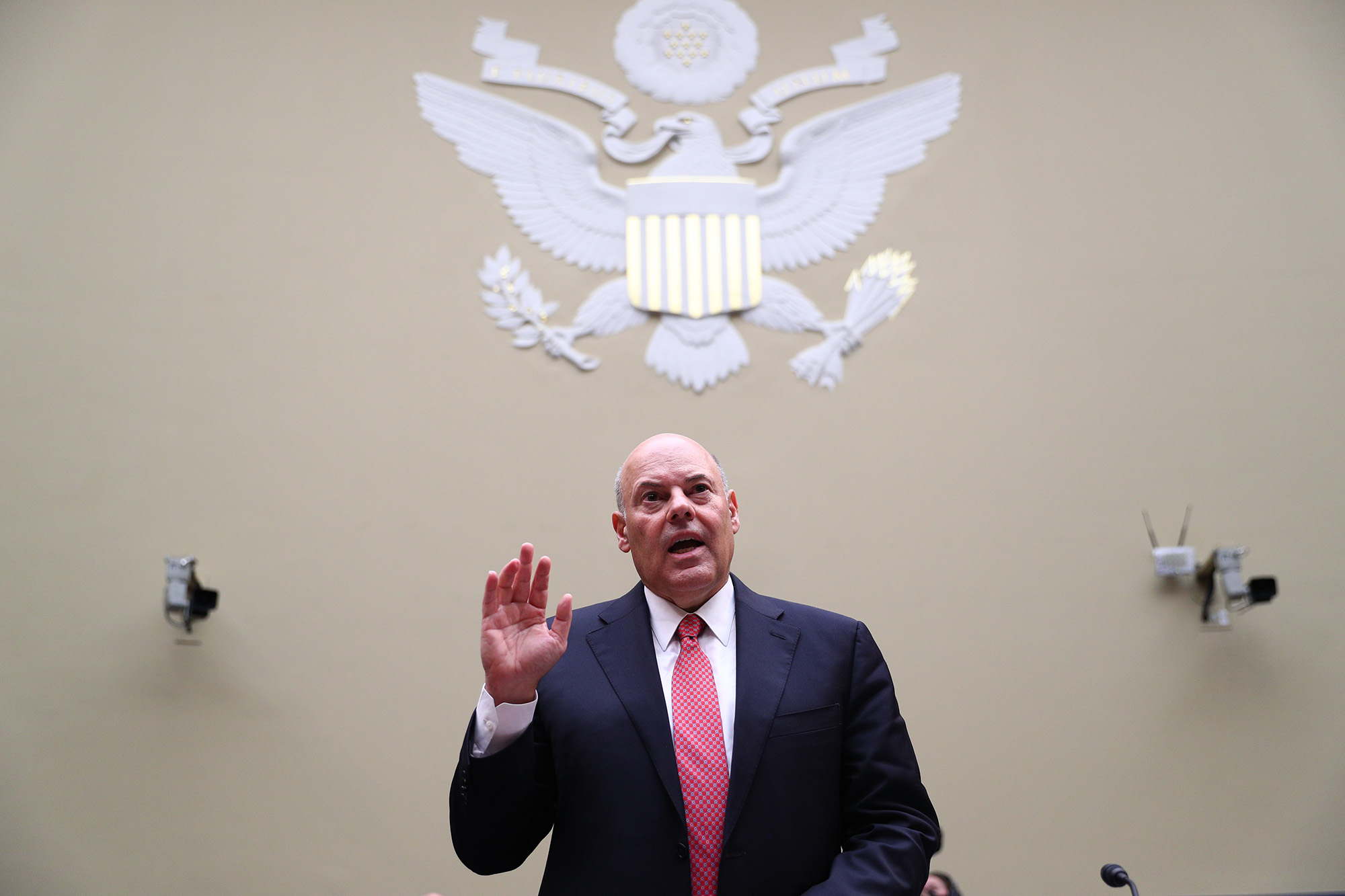 Louis DeJoy is sworn in prior to a House Oversight and Reform Committee hearing in Washington on Aug. 24.
