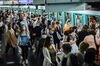 Morning rush hour commuters wear protective face masks while boarding and exiting a train at Saint-Lazare metro railway station in Paris, France, on Wednesday, Sept. 9, 2020. France reported more than 6,000 new coronavirus infections on Tuesday as the pace of laboratory-confirmed cases picked up again after a post-weekend lull.