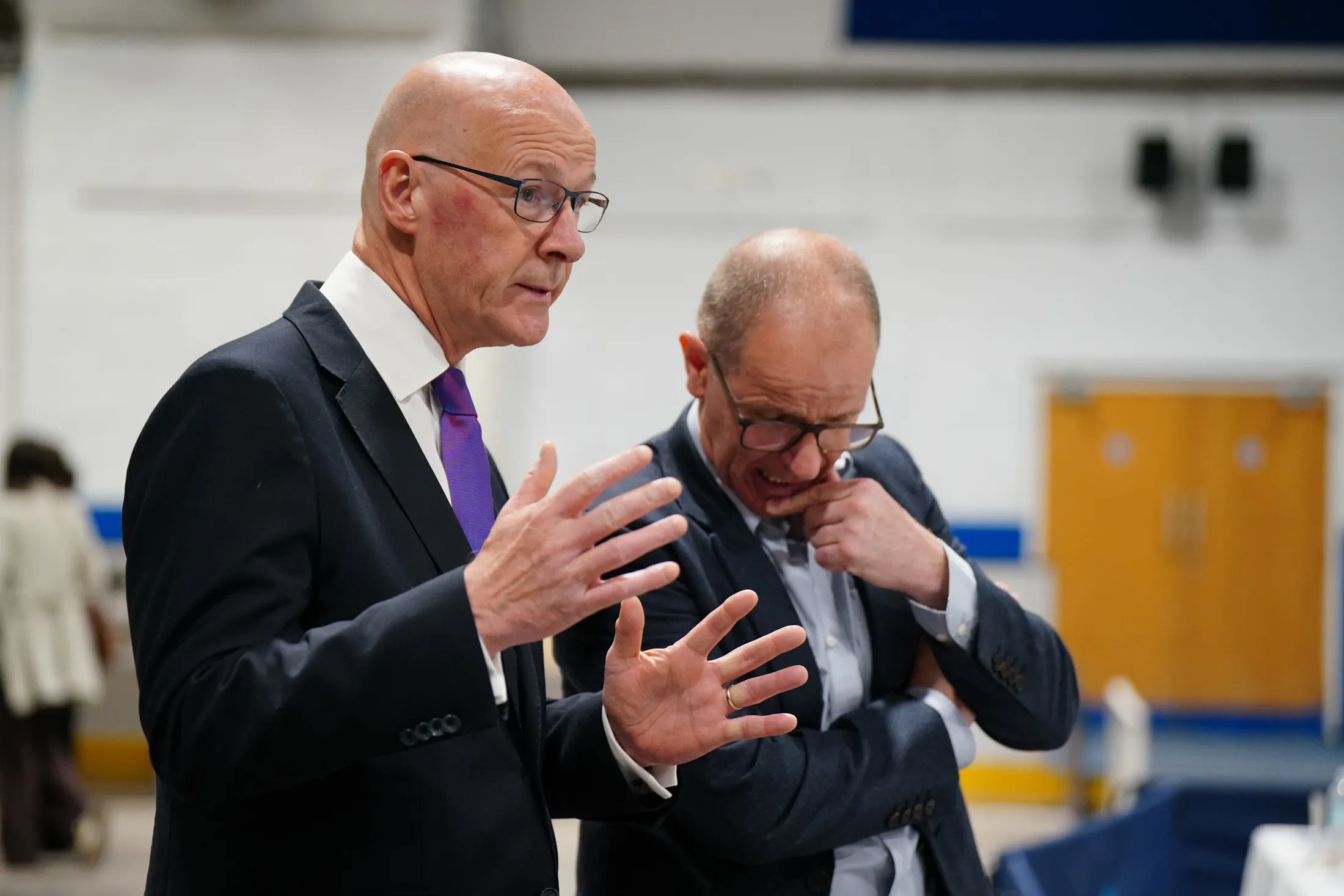 John Swinney, left, on July 5.