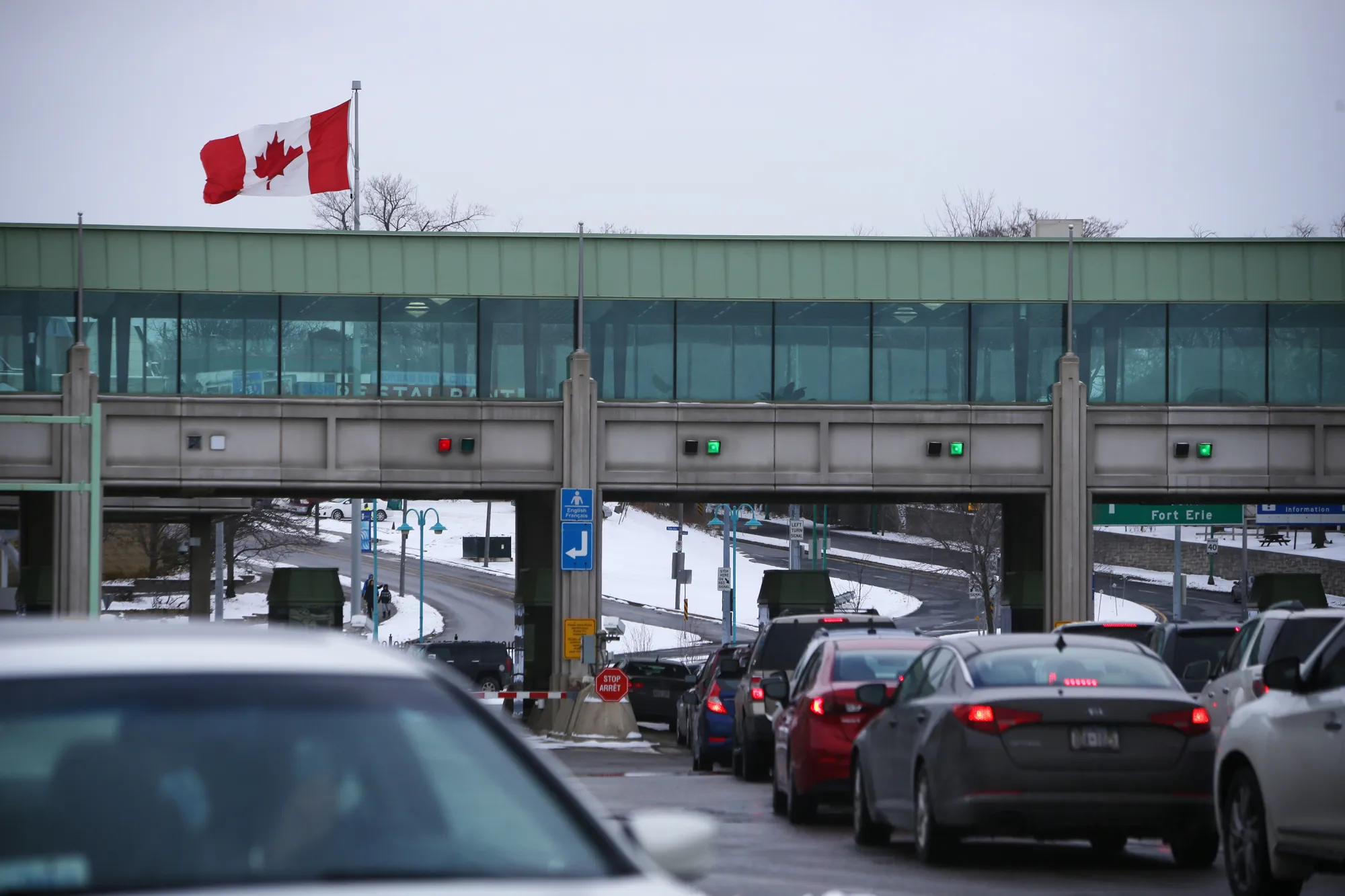 Cars line up at the Canadian border crossing in Niagara Falls.