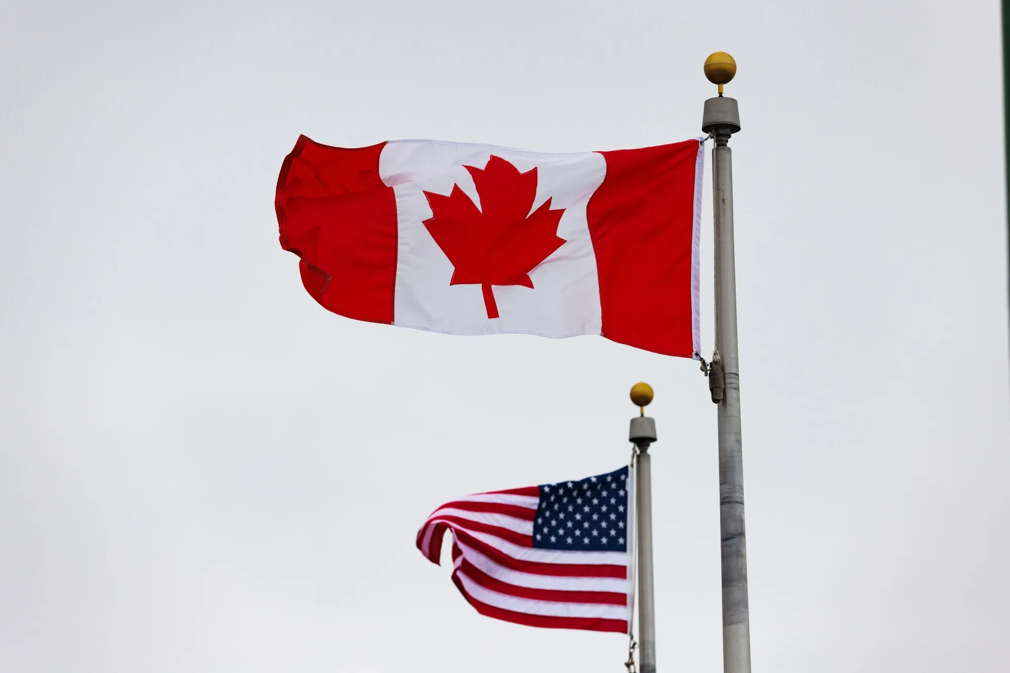 Canadian and US flags fly on Peace Bridge at the Canada-US border in Fort Erie, Ontario&nbsp;on Feb. 3.&nbsp;