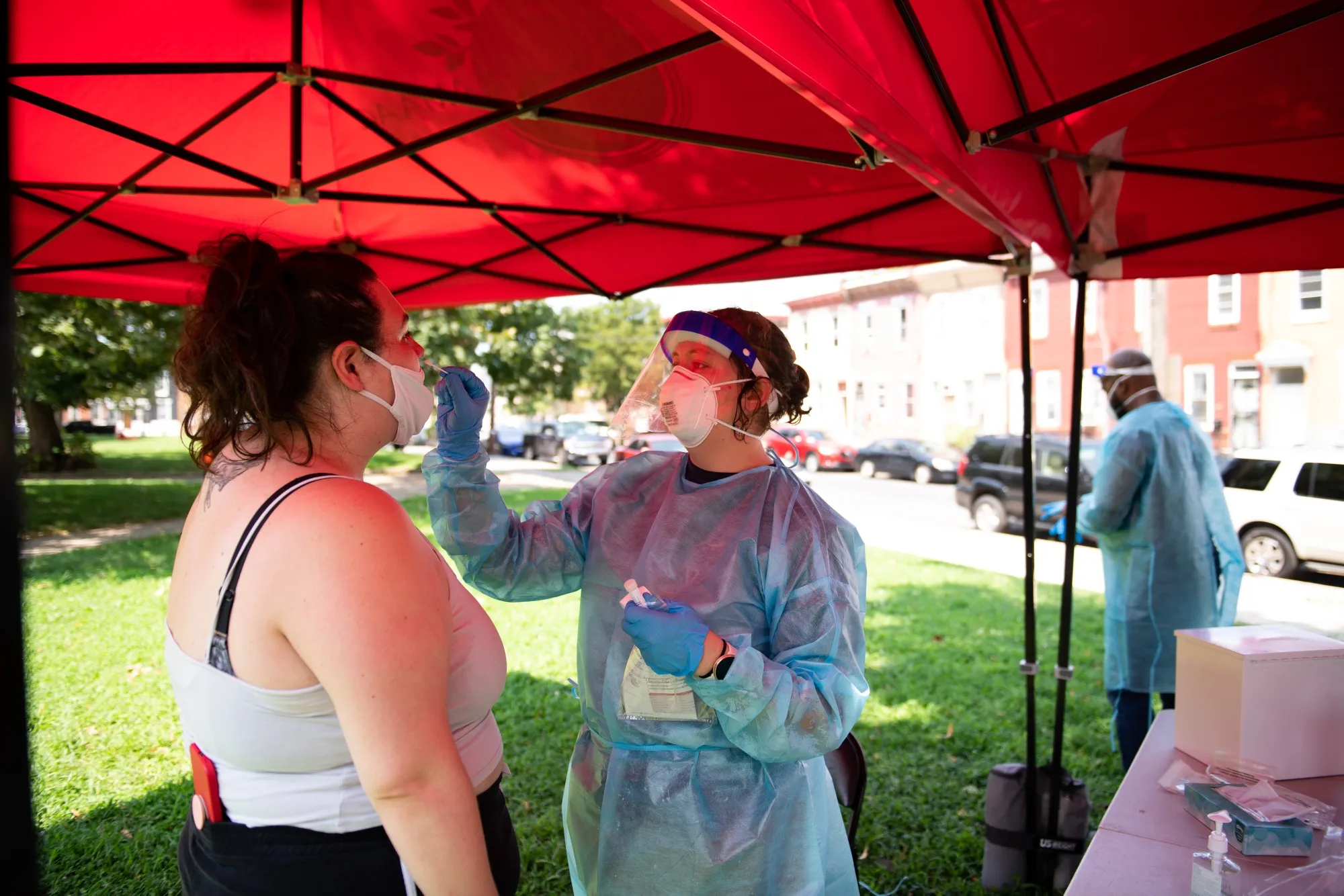 A healthcare worker administers a Covid-19 test at a testing site in Philadelphia, Pennsylvania, on&nbsp;Aug. 12.