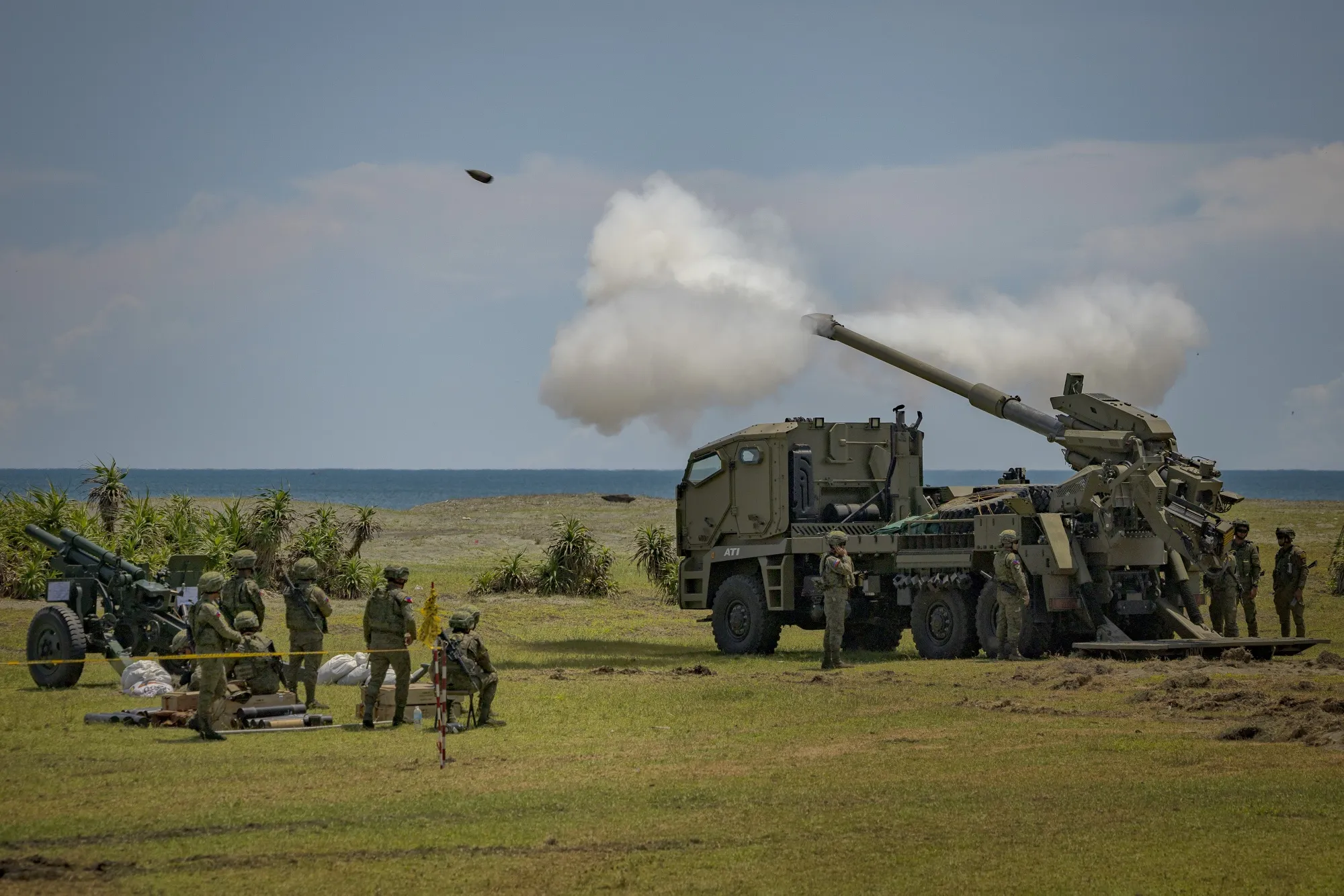 Philippine troops fire an ATMOS 155mm howitzer as part of U.S.-Philippines joint military exercises in Aparri, Cagayan province, Philippines.&nbsp;