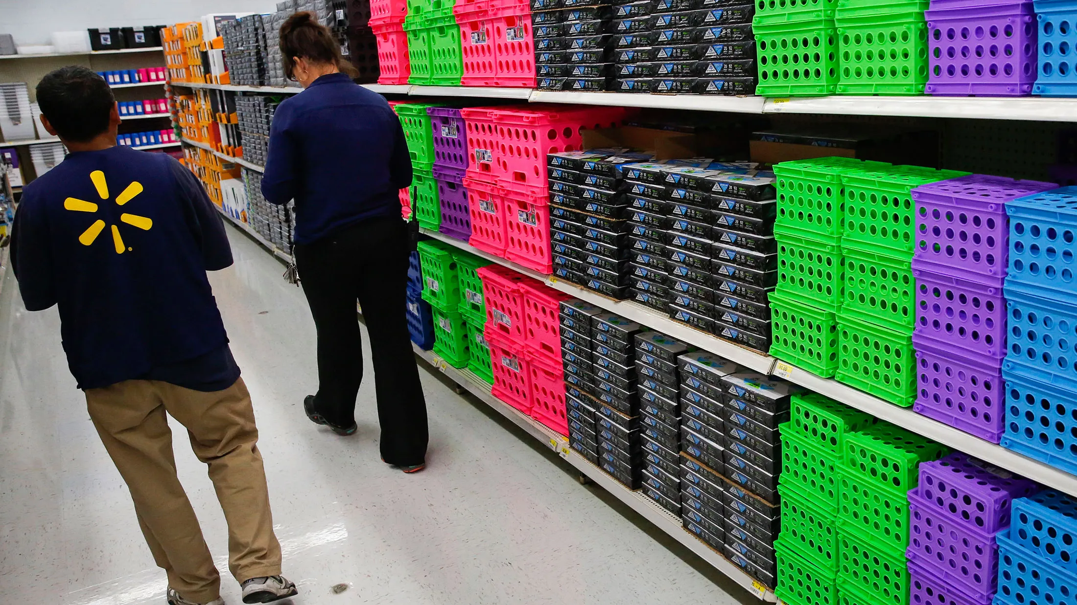 Wal-Mart Stores Inc. workers at a location in the Porter Ranch neighborhood of Los Angeles, California.
