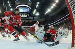 The New Jersey Devils defend the net against the Carolina Hurricanes at the Prudential Center on Dec. 29, 2015 in Newark, N.J.

