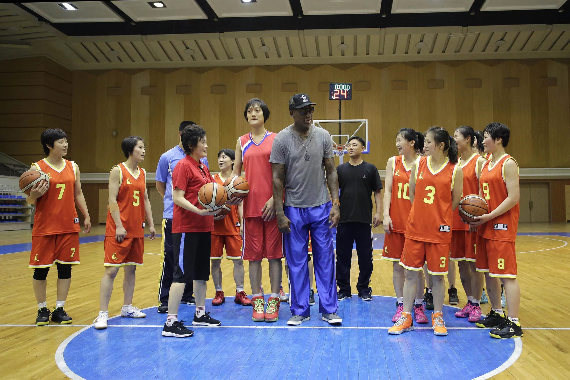 Dennis Rodman talks to North Korea's Pothonggang women's basketball team during his visit to Pyongyang on June 14.
