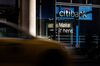 Vehicles pass in front of a Citigroup Inc. bank branch in New York, U.S.