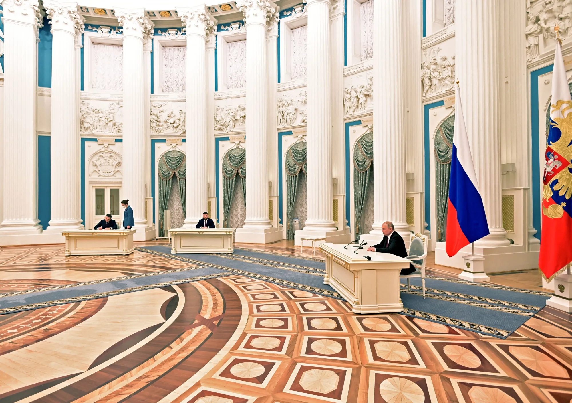 Putin at a ceremony recognizing&nbsp;two Russian-backed breakaway regions in eastern Ukraine as independent.