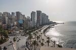 Residential and commercial buildings stand along the waterfront in Beirut.