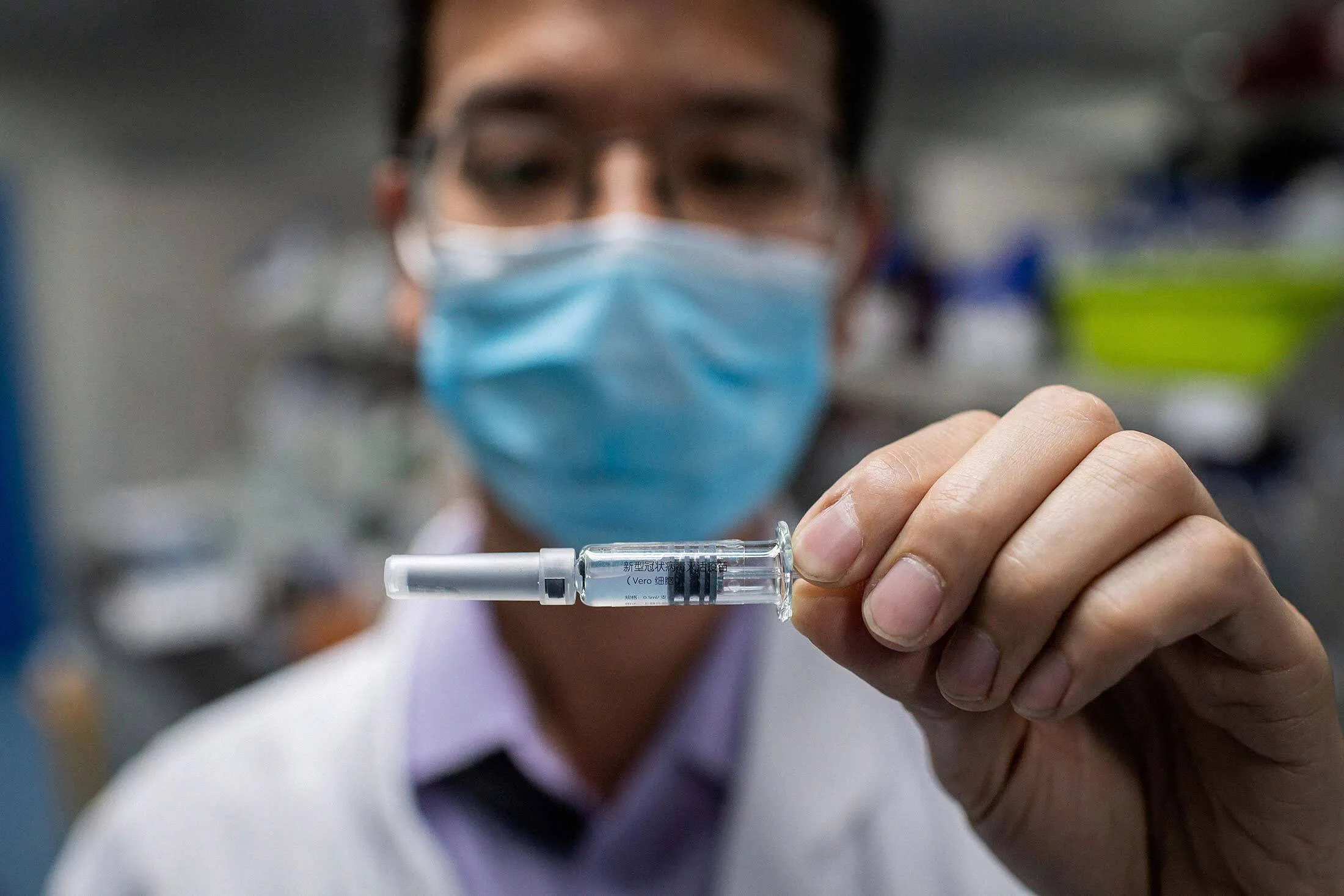 An engineer with an experimental Covid-19 coronavirus vaccine at Sinovac Biotech’s facilities in Beijing, on April 29.