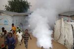 Children run away from a fumigation machine used against&nbsp;coronavirus, in Borno State, Nigeria.&nbsp;